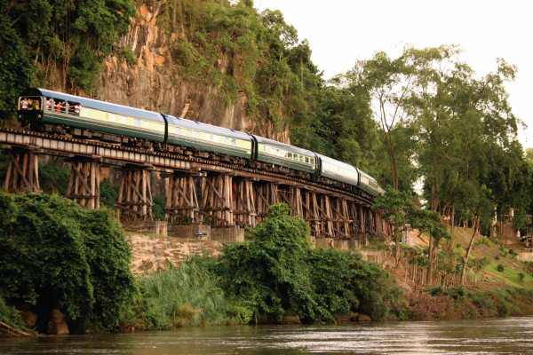 Nick Walton explores the lush landscapes of Southeast Asia aboard the region's most luxurious train, Belmond's Eastern & Oriental Express. 
