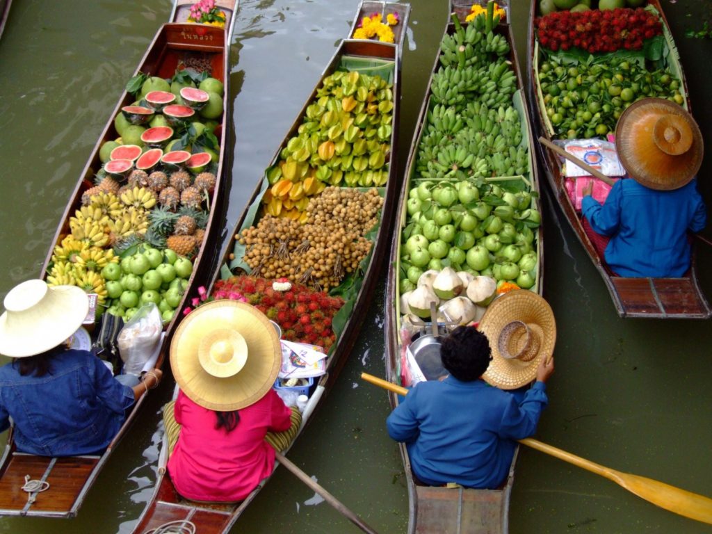 The best way to explore Thailand's vibrant capital, Bangkok, is through its bustling open-air markets. 