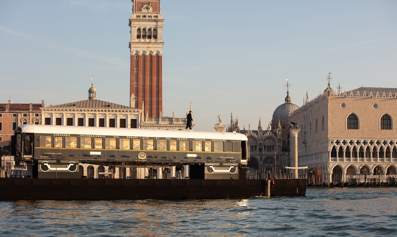 The Venice Simplon-Orient-Express, A Belmond Train, Europe remakes history by bringing L’Observatoire – a private and exclusive sleeper carriage designed by leading artist JR – to Venice for a one-of-a-kind project reveal.